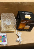 Rotating Water Ripple Night Light Aura Lamp - MaxShopRotating Water Ripple Night Light Aura LampLighting & Home Decor3ugx81 - ttCustom productUSB dynamic water pattern light with packaging, remote control, and USB cable on a cardboard surface.USB dynamic water pattern light with packaging, remote control, and USB cable on a cardboard surface.
